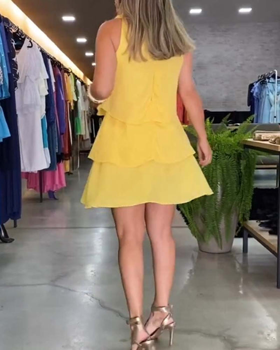 Ärmlös dubbel lager volangklänning