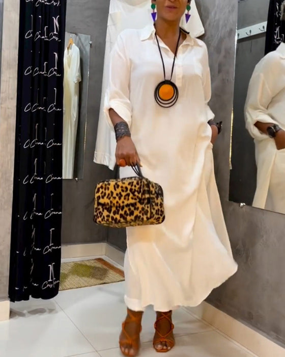 Enfärgad klänning med lapelficka