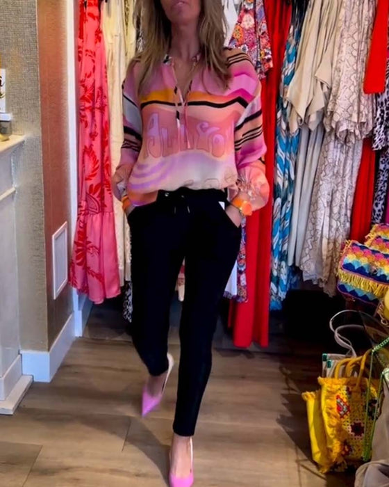 Casual topp med fjädring i kontrasttryck