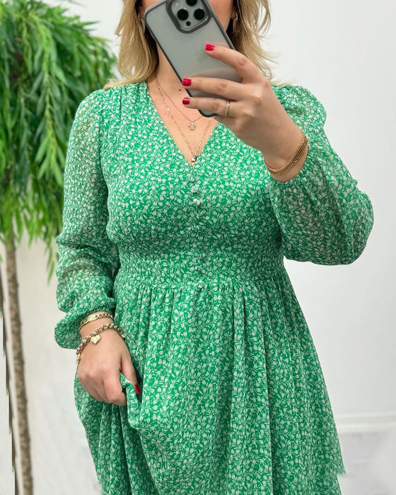 Elegant klänning med tryck