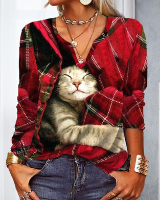 Topp med kattpaneler och långa ärmar