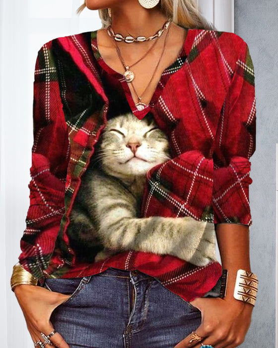 Topp med kattpaneler och långa ärmar