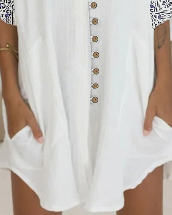 Klänning med 3/4-ärmar och knappar