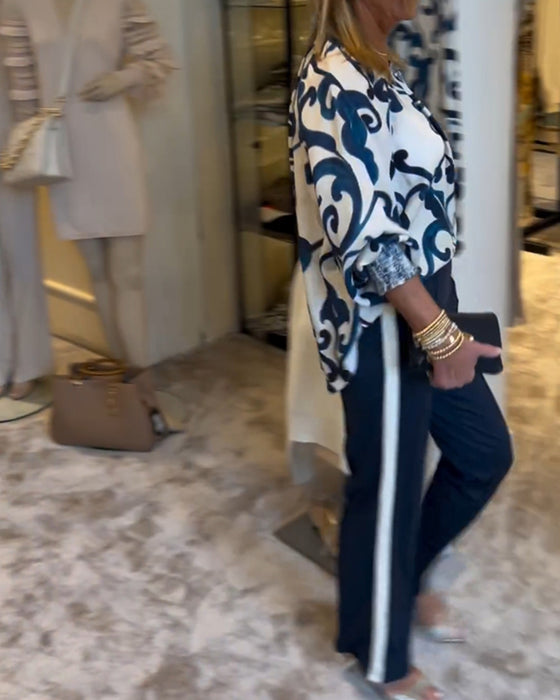 Blus i retromönster med lyktaärm