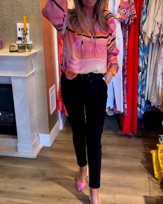 Casual topp med fjädring i kontrasttryck