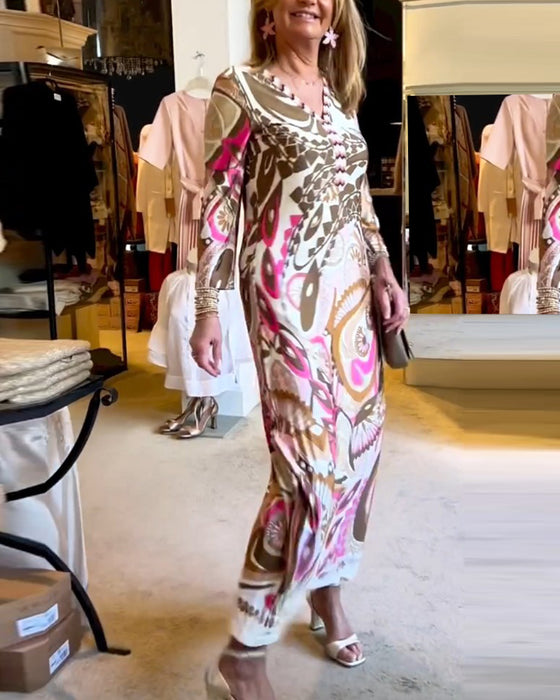 V-ringad lång klänning med tryck