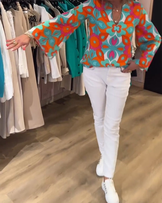 Blus med lösa, mångsidiga stilar och tryck