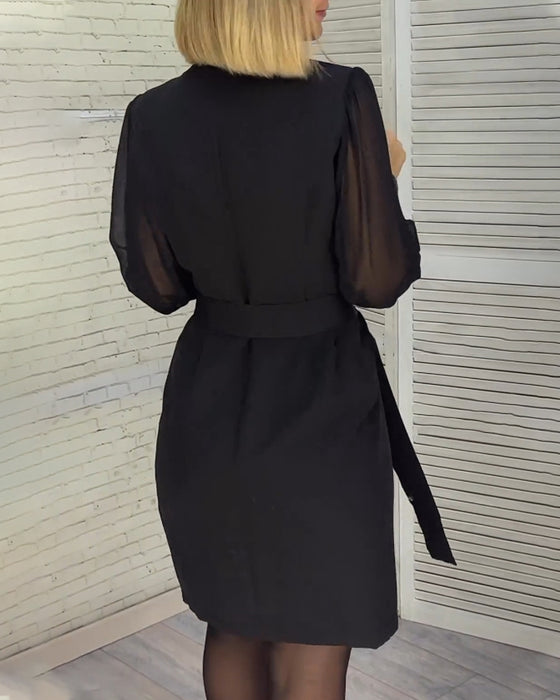 Klänning med paljettpaneler och långa ärmar