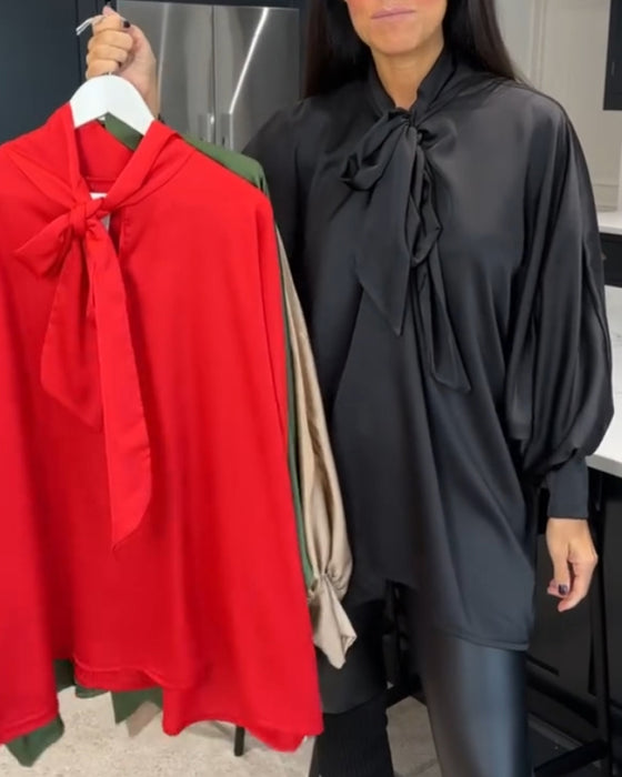 Enfärgad och elegant blus med bandkrage