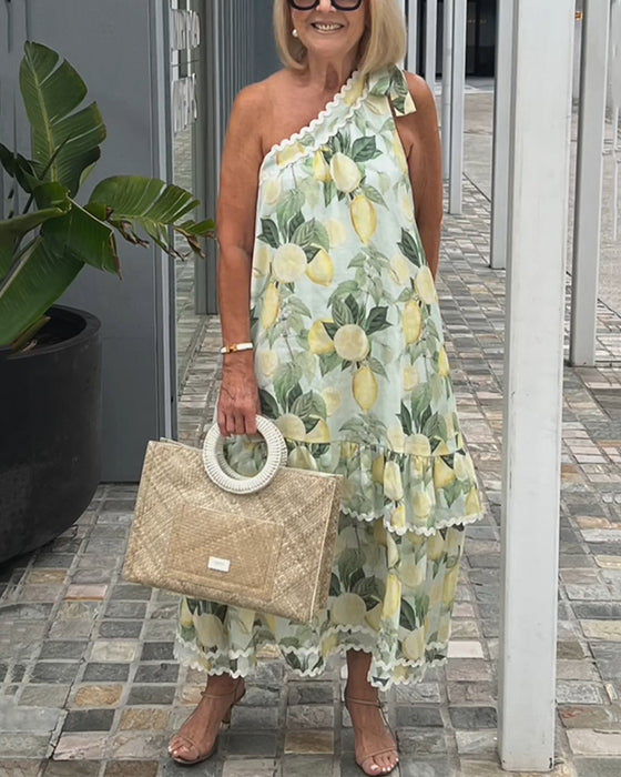 Enaxlad klänning med blommönster