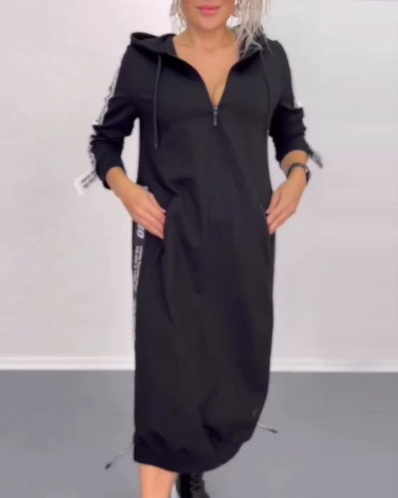 Avslappnad klänning med dragkedja