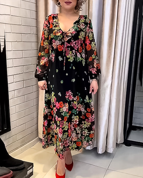 Blommig V-ringad elegant klänning