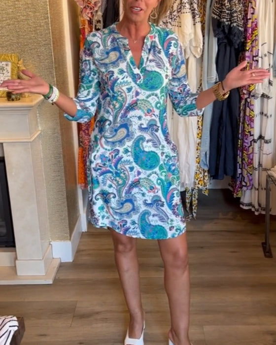 Klänning med 3/4-ärmar och fickor