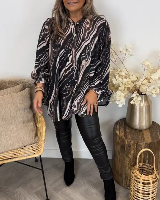 Blus med retrostil och långa ärmar