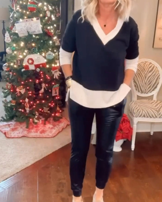 Avslappnad topp med v-ringning och färgblock